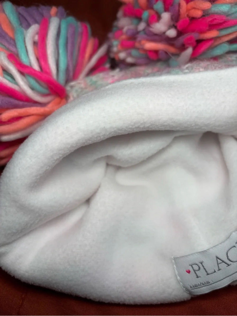 Cute colorful pompom hat! Fleece inside from Children’s Place